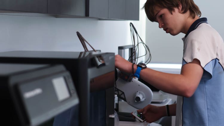 A student in a STEM classroom.