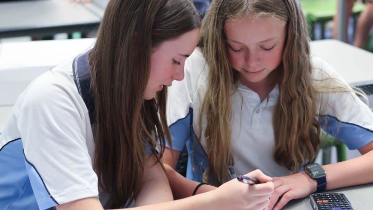 Two students in a Maths class.