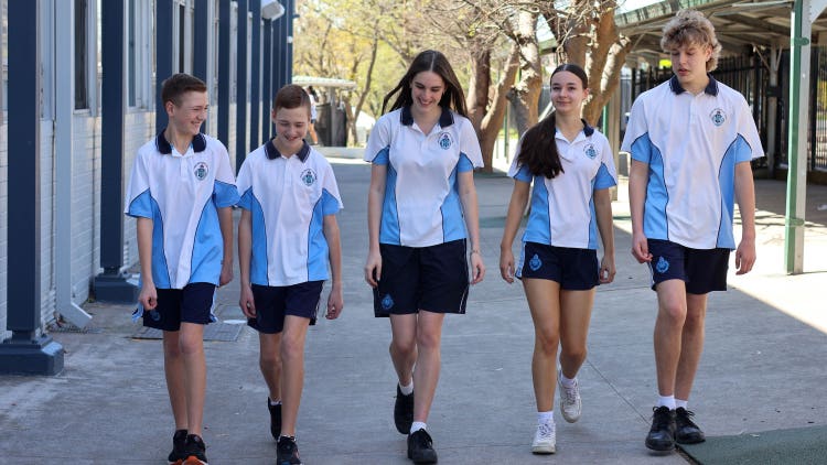 Students walking in school grounds