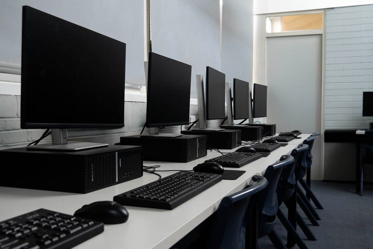 A row of computers in the computer lab.