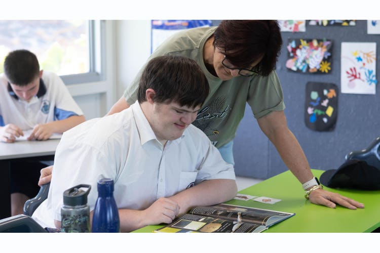 Student and staff in the classroom
